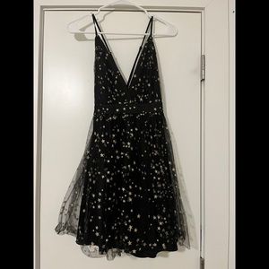Favorite Moment Gold and Black Star Print Skater Dress